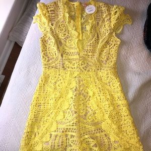 Yellow lace romper from the Southern Bunny